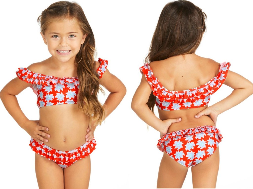 little girl modeling blue and red flower swim suit