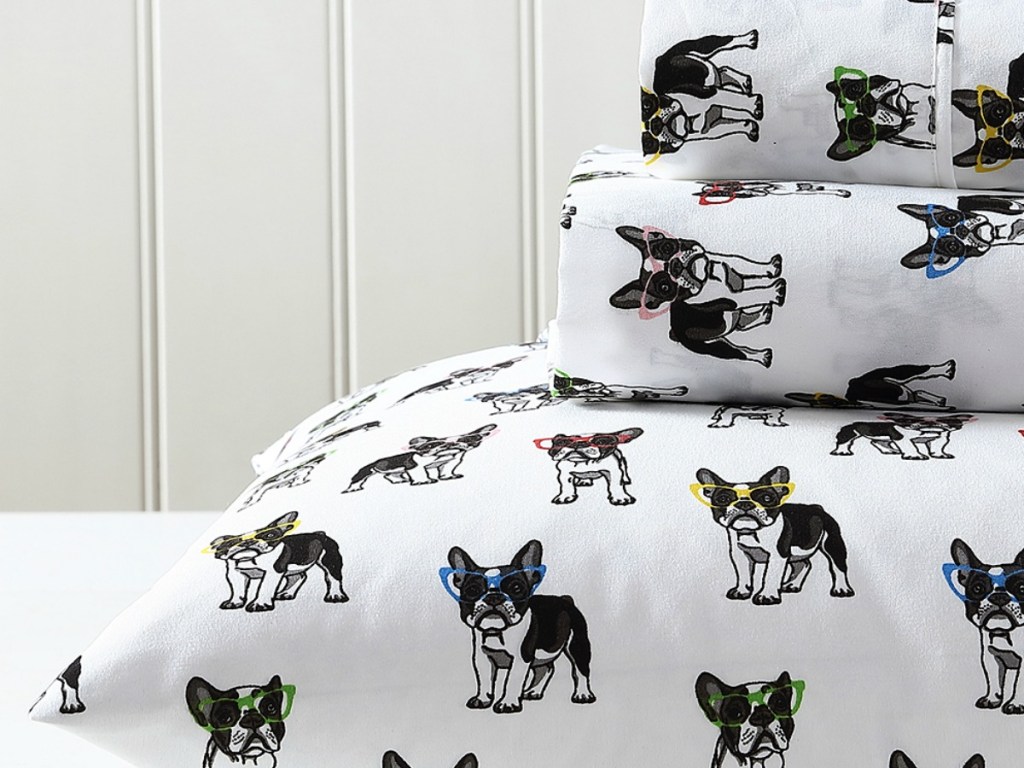 white sheets with french bulldogs wearing glasses on them