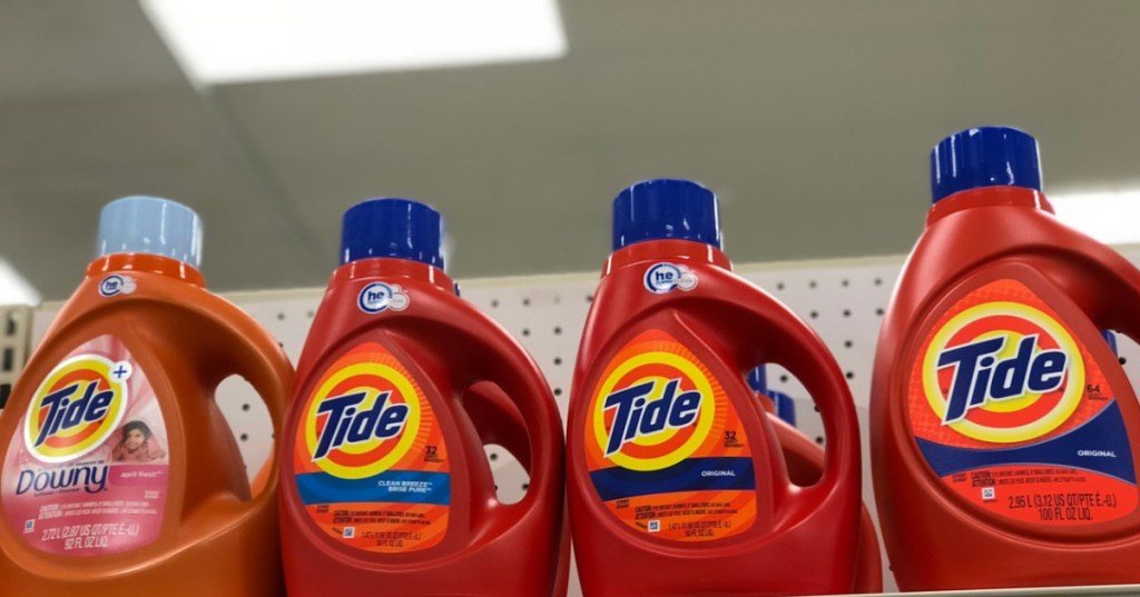 bottles of tide laundry detergent on shelf