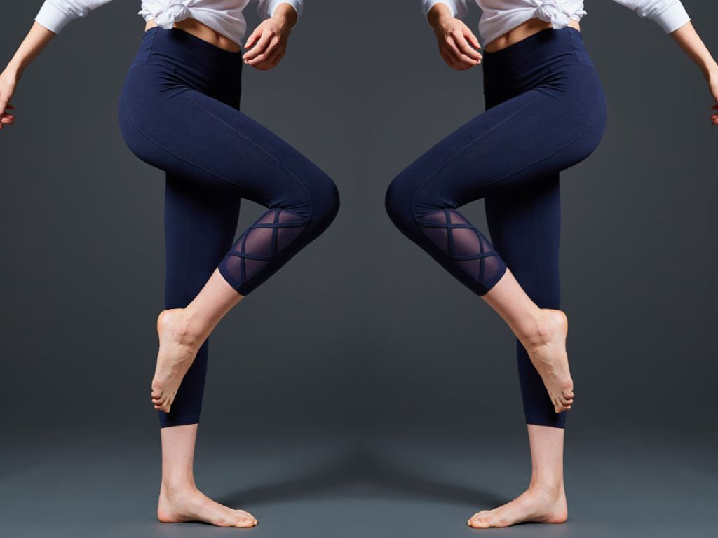 woman wearing navy Tummy-Control Brooke High-Waist Crop Leggings