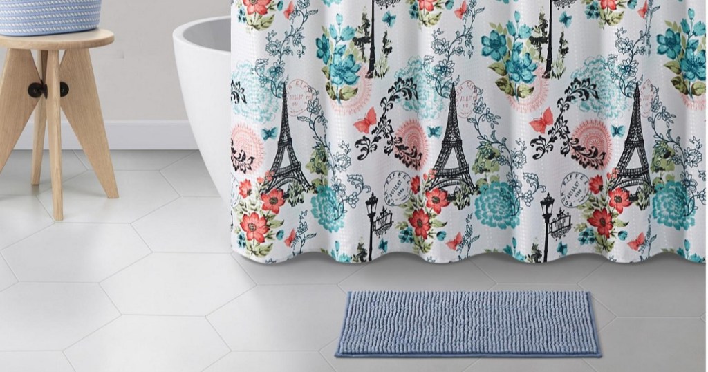 shower curtain, rug and bathroom decor in bathroom