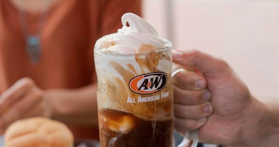 person holding a root beer float