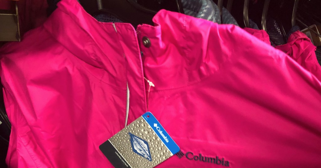 columbia girls rain jacket on a hanger