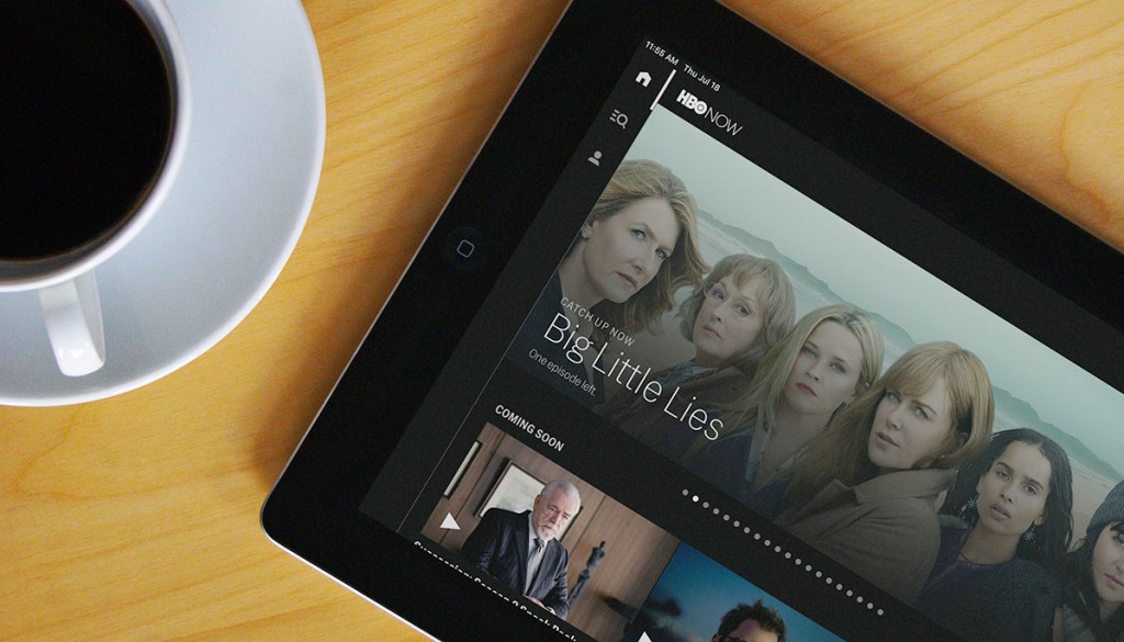 hbo now app on ipad next to cup of coffee