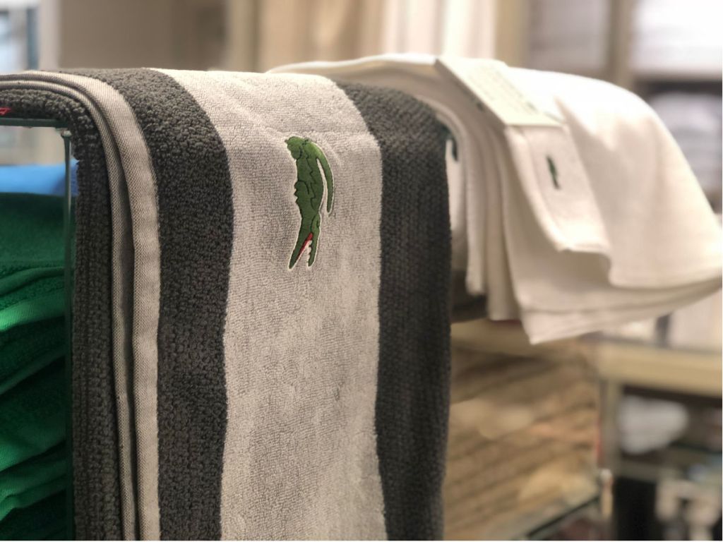 grey lacoste towel in store