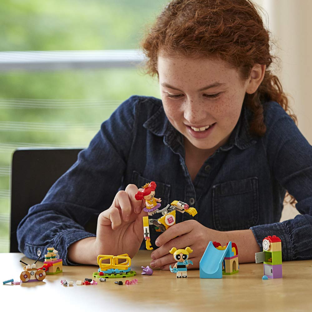 Girl Playing with Powerpuff LEGO set