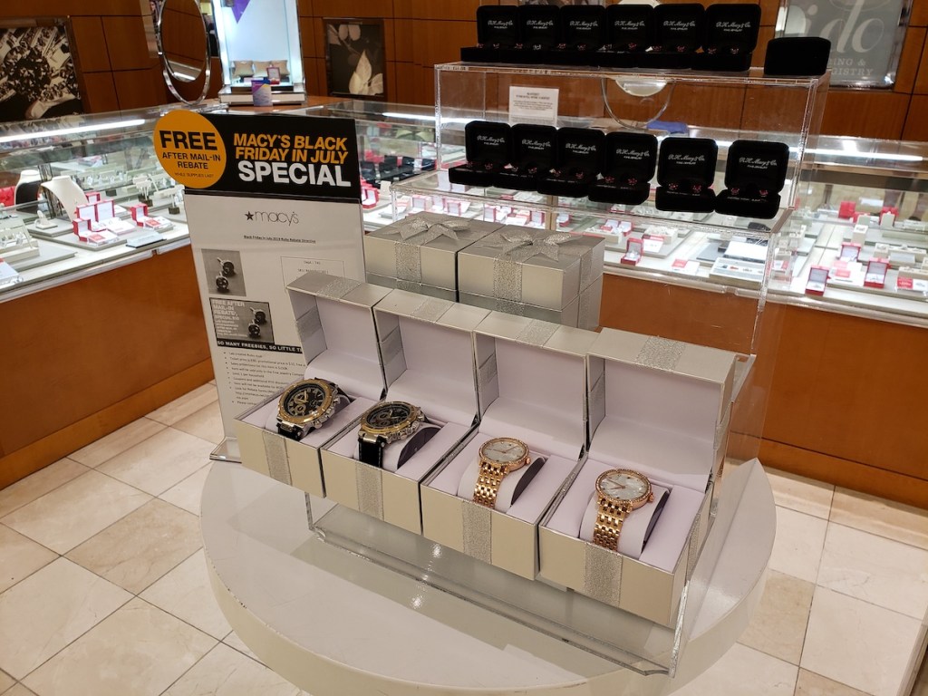 men and womens gold watches at macys on display