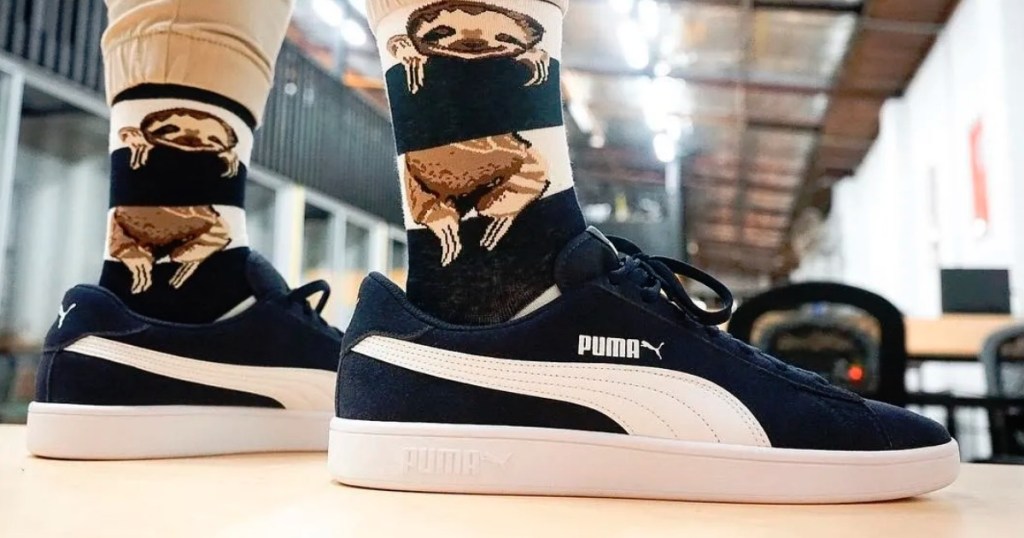 woman wearing puma shoes 