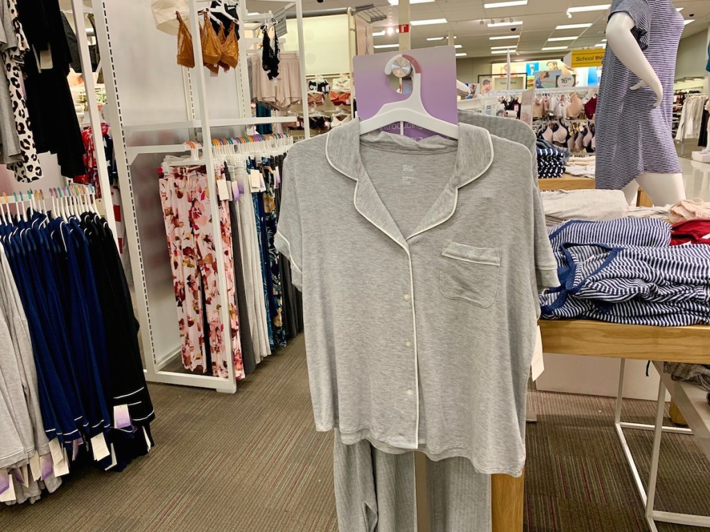 gray pajamas hanging in store 