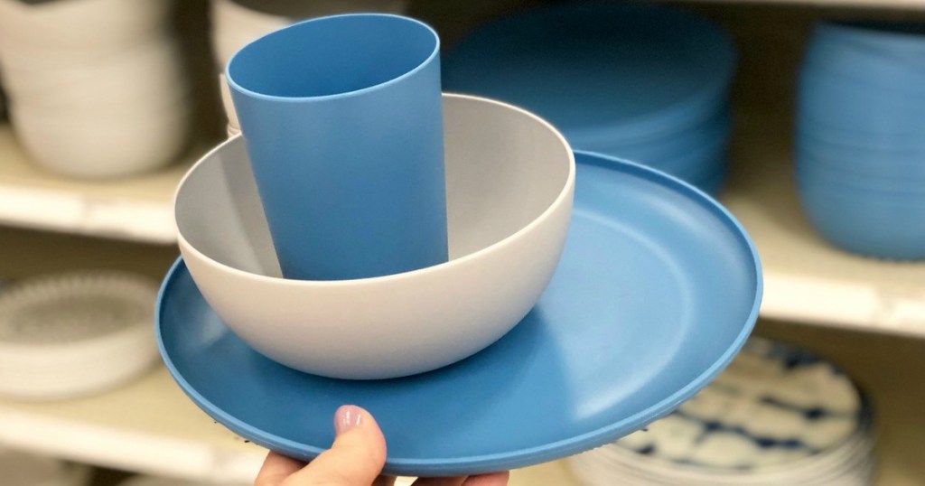 hand holding room essentials dinnerware at target