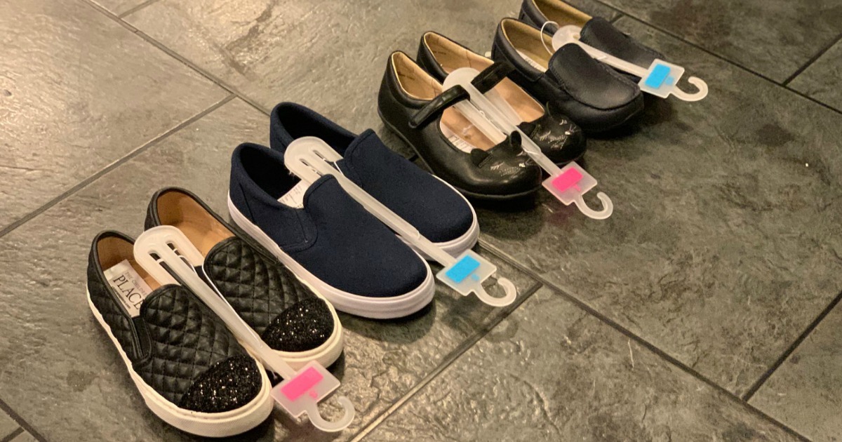 sets of shoes lined up on store floor