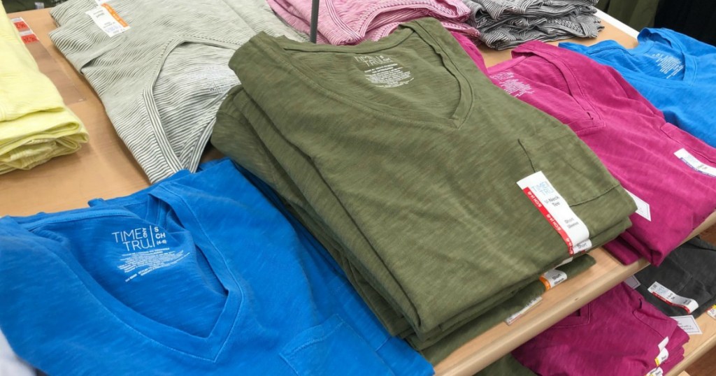 t shirts on table in store