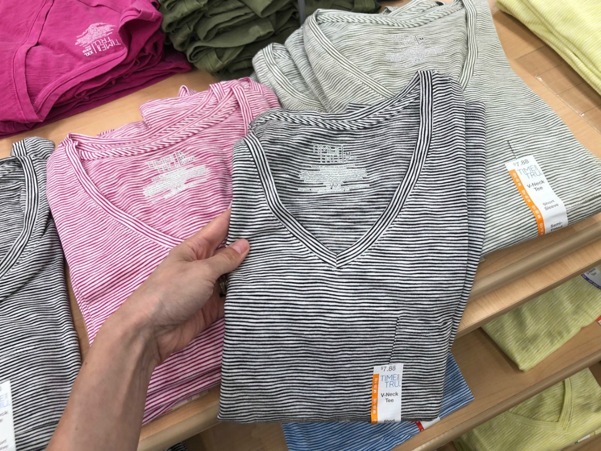 stack of t-shirts at store on display