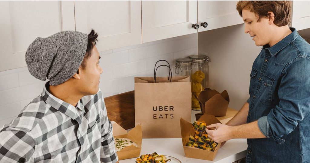 adults eating uber eats