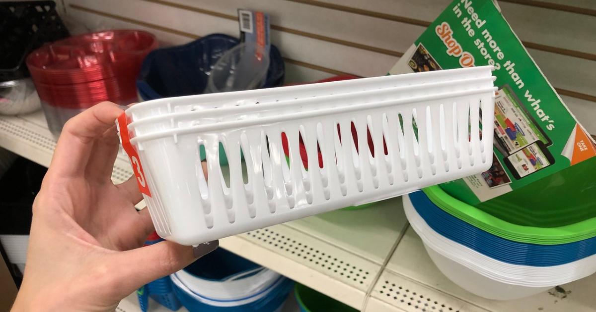 woman holding 3 basket bundle at dollar tree