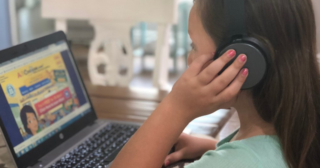 ABC Mouse little girl working on onlineputer wearing headset