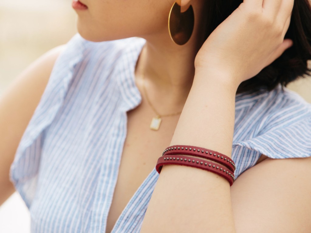 Woman wearing Annie Starfish Burgundy; Leather Wrap Bracelet