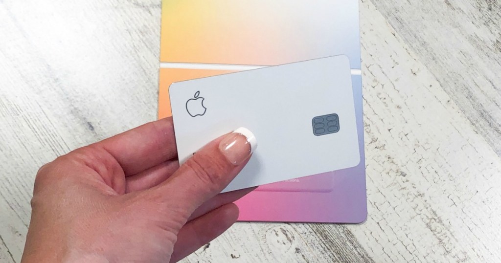 Woman holding Apple Card