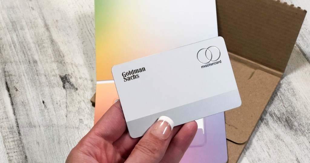 Woman holding Apple Card