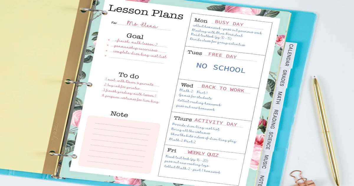 Clear dividers in a blue three ring noteboook with a lesson plan on top.