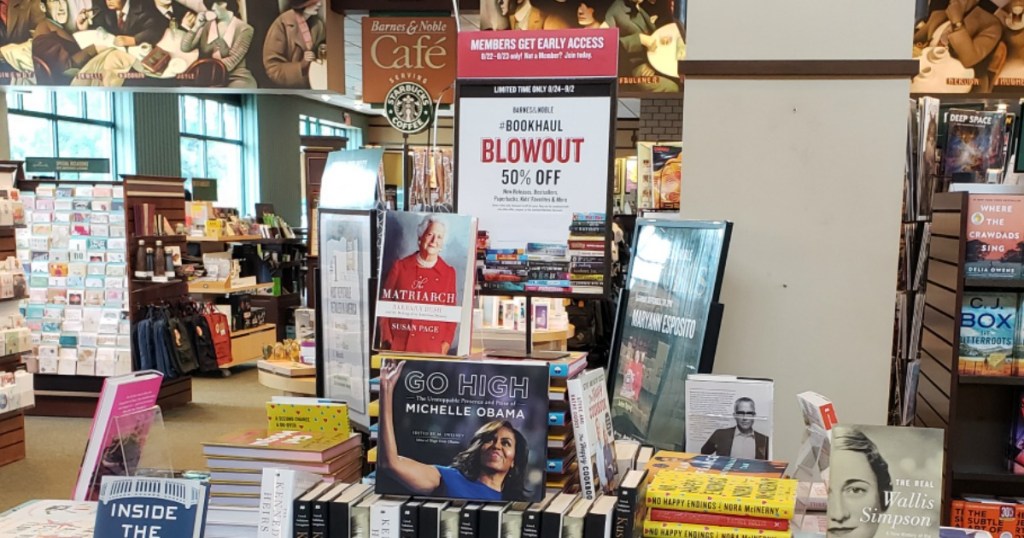 pile of books and Barnes & Noble sign