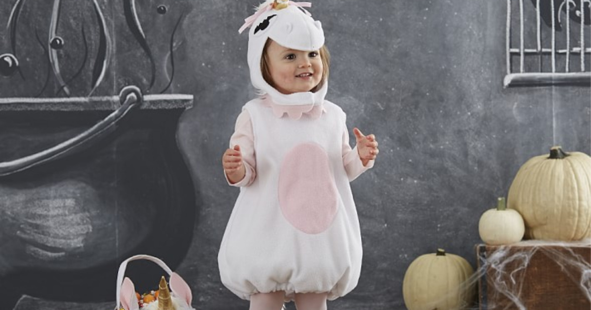 girl wearing carters unicorn costume