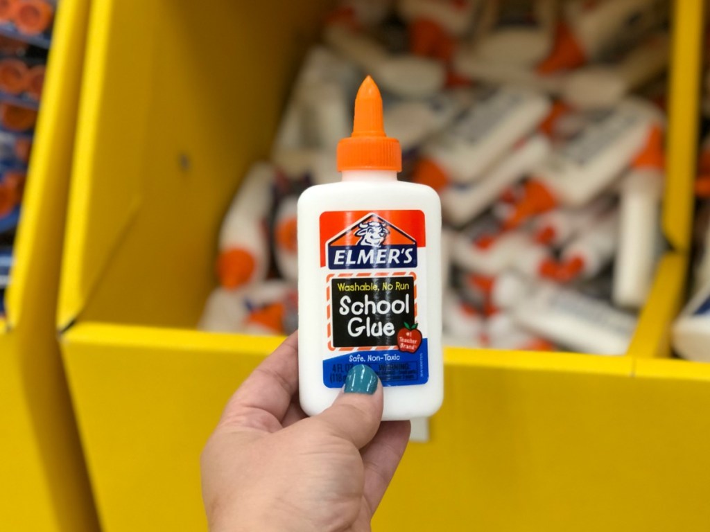 elmer's glue in hand