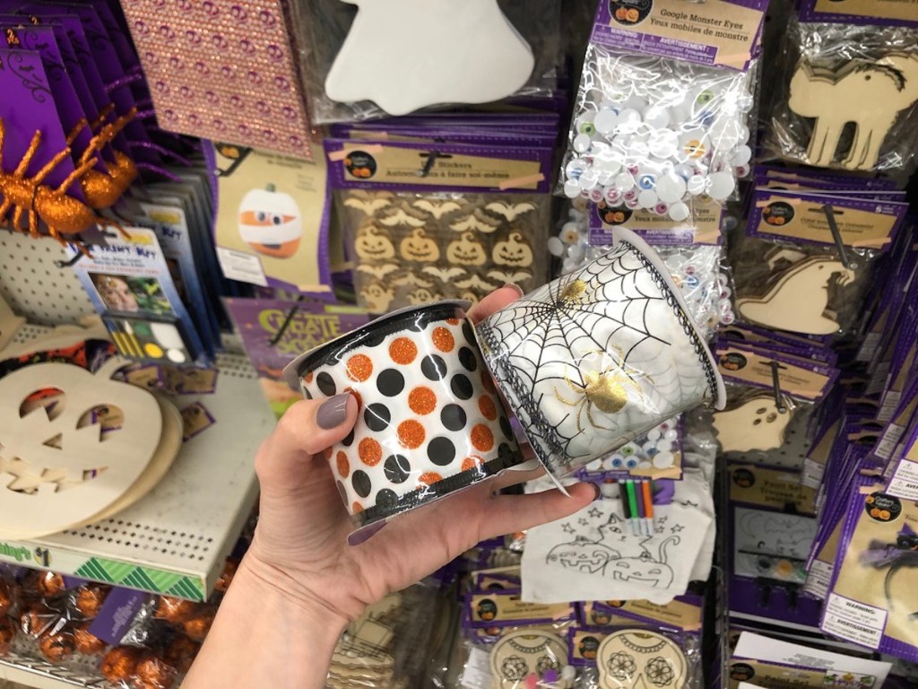 hand holding Halloween ribbon