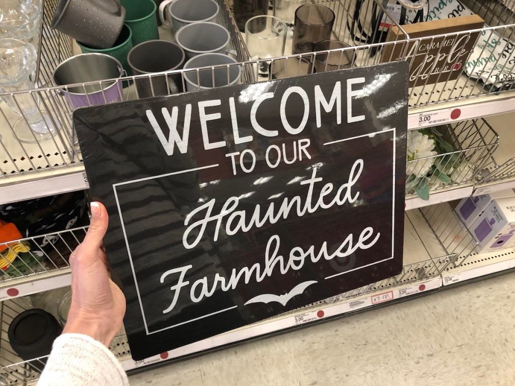 hand holding Haunted Farmhouse Tray