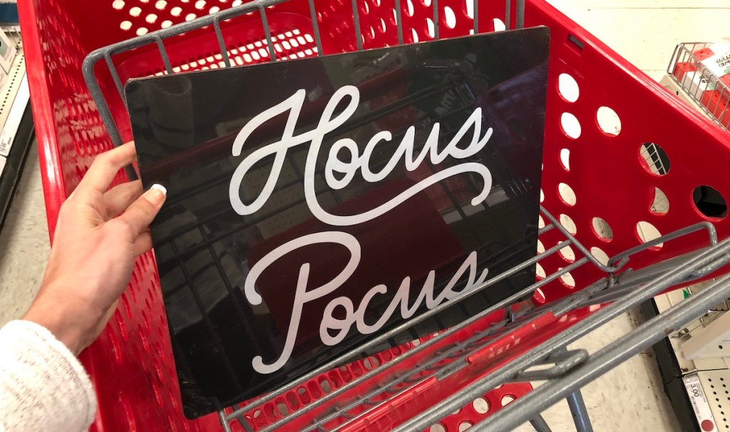 hand holding Hocus Pocus Tray in Target Cart