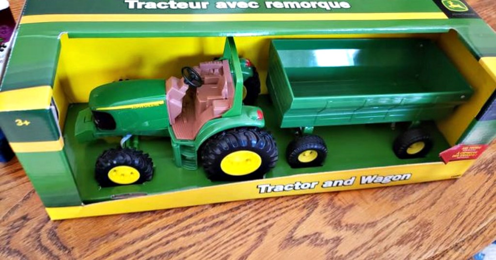 john deere toy sitting on table