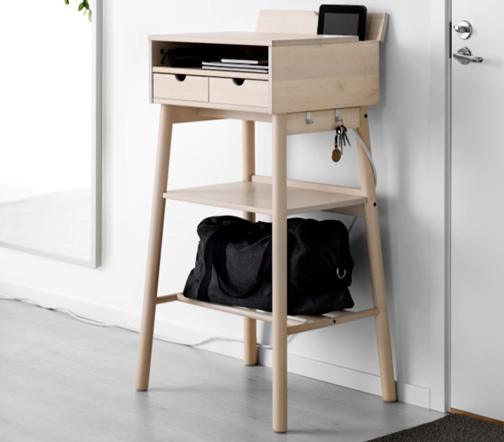 IEKA standing desk against wall