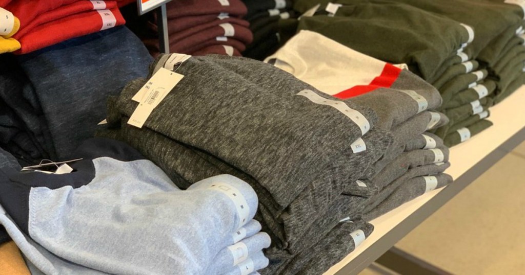 Old Navy men's sweatshirts on table