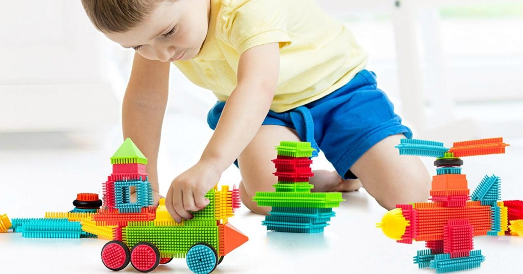 child playing with Bristle Blocks