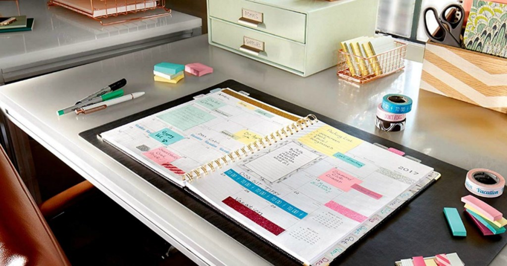 planner with post-it notes on it