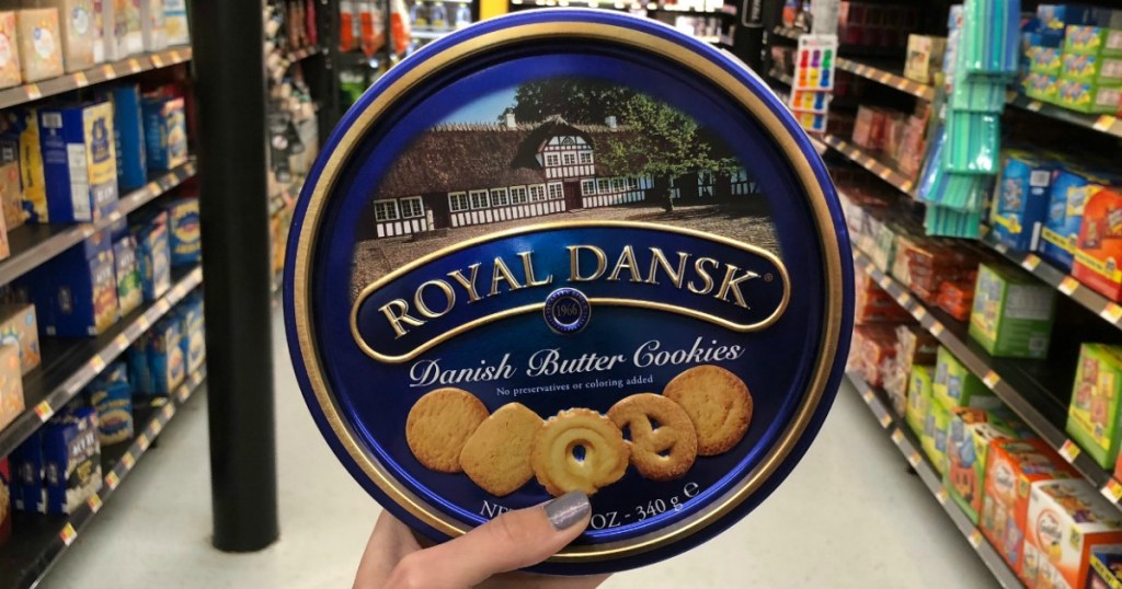 Tin of danish butter cookies in store in hand