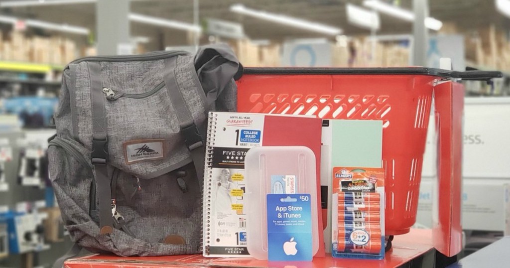 Staples back to school items next to shopping basket