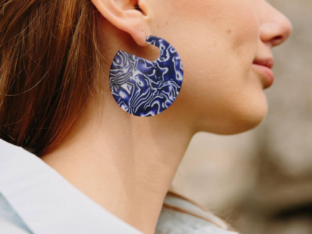 Woman wearing Starfish Project Winnie Earrings