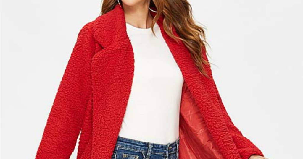 Woman wearing red teddy coat