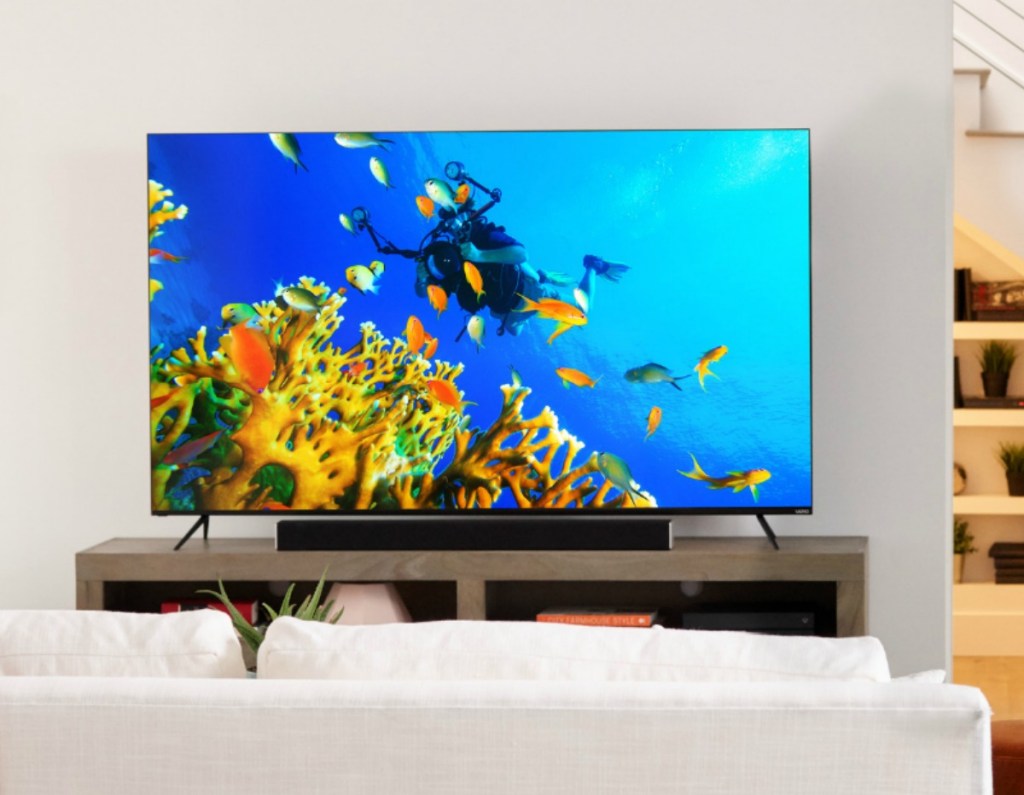 Vizio Smart TV in living room set up on entertainment stand with underwater scene