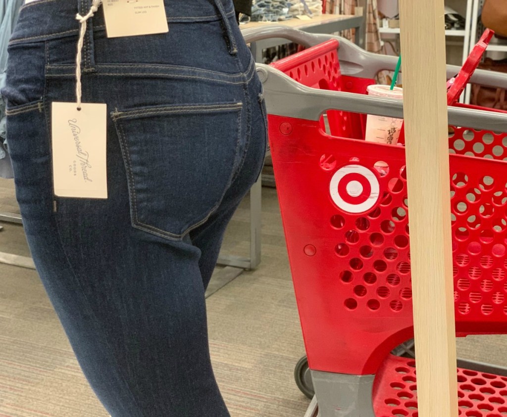 Women's Jeans in Target on display near cart in a dark wash