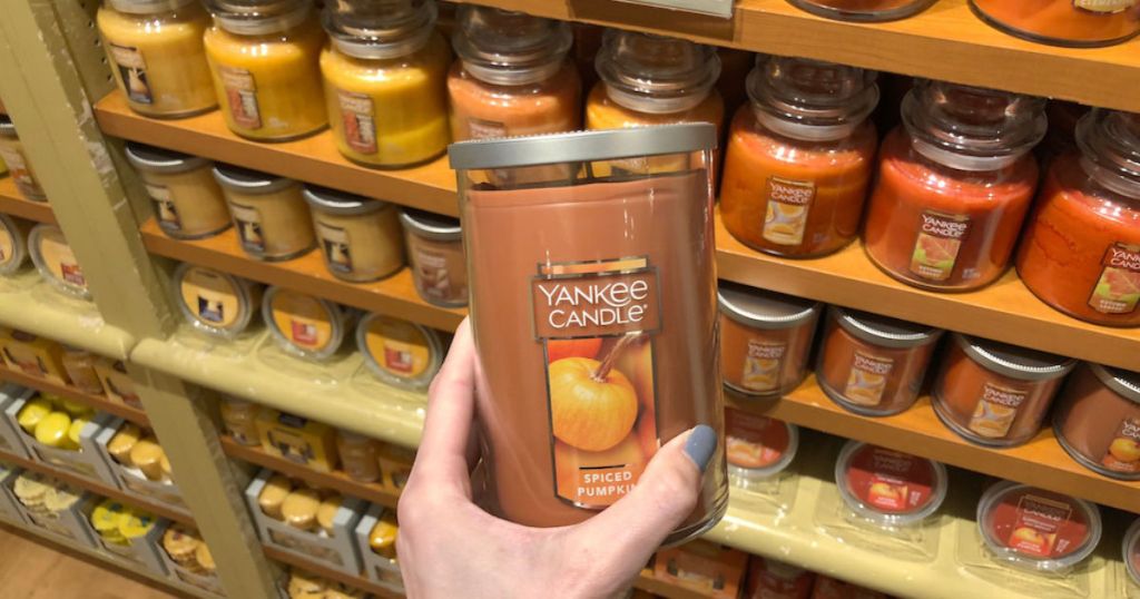 woman hand holding Yankee Candle Spiced Pumpkin Tumbler