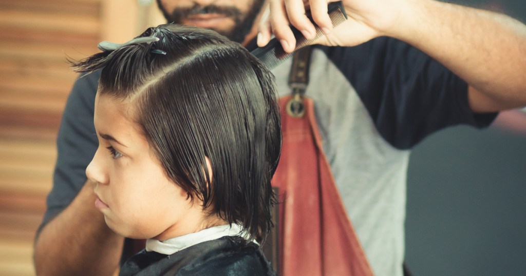 boy getting his hair cut