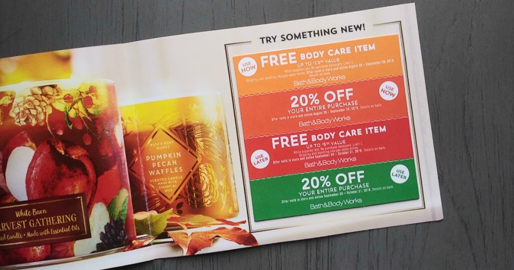 bath and body works coupon sitting on table