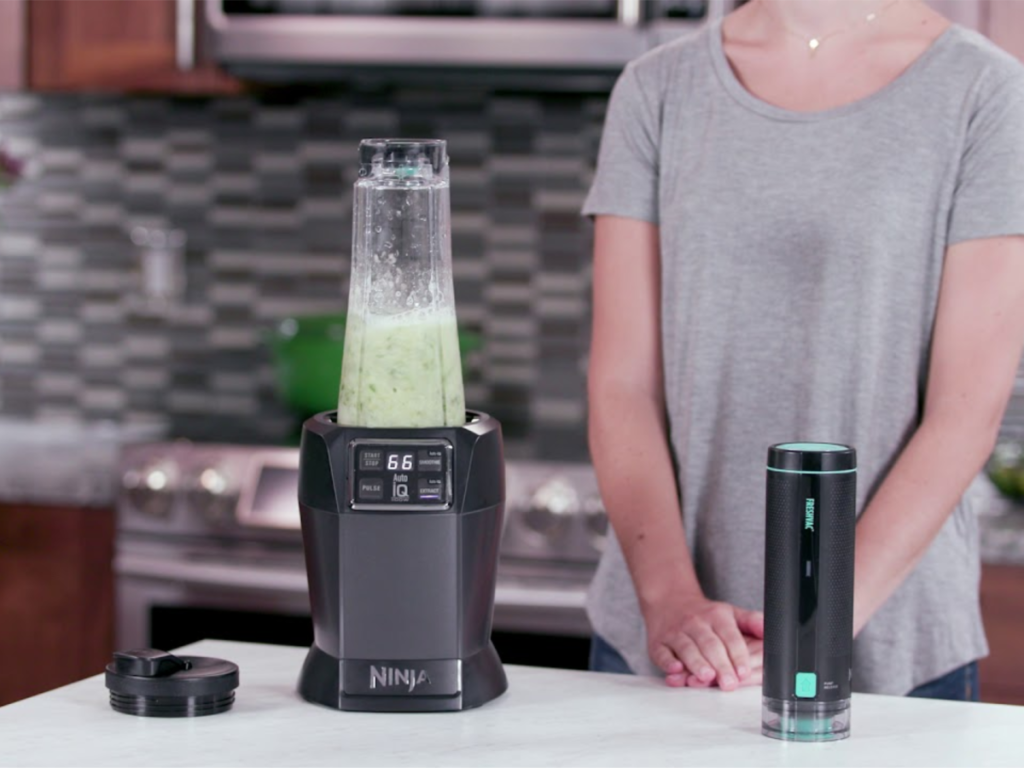 ninja blender with freshvac technology with woman counter