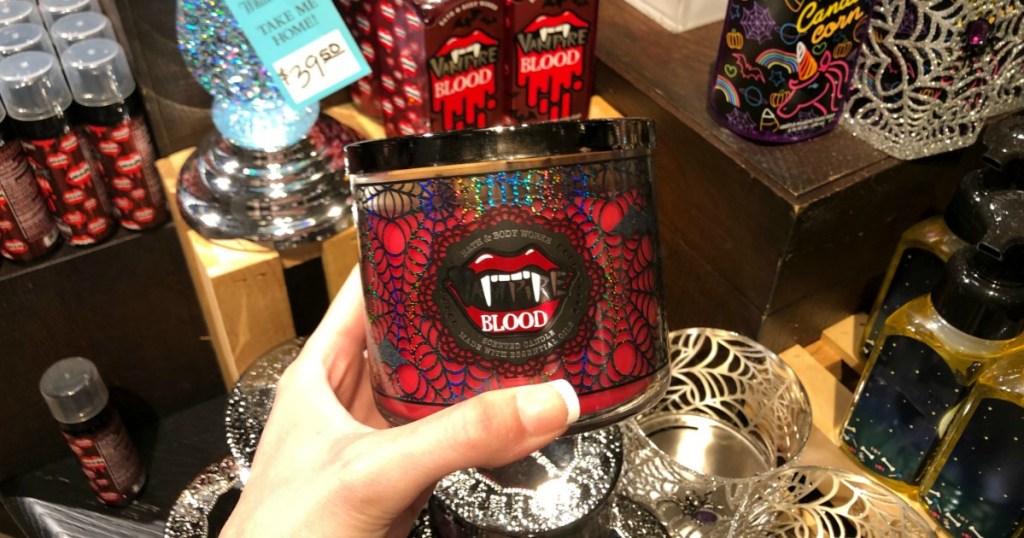 hand holding blood candle