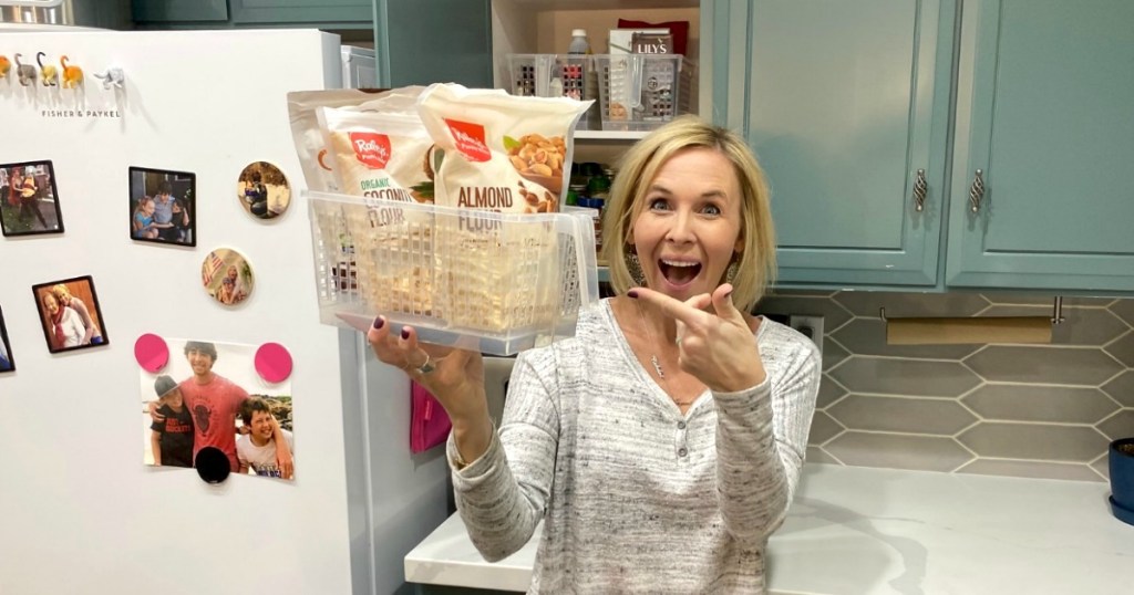 woman holding pantry basket with almond flour inside