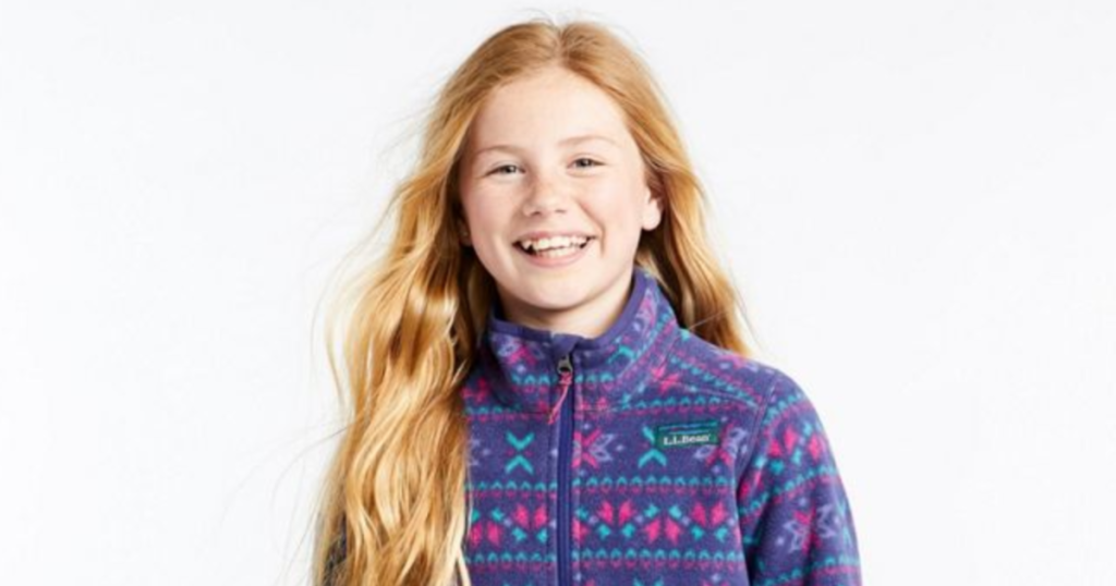 girl laughing with llbean jacket on