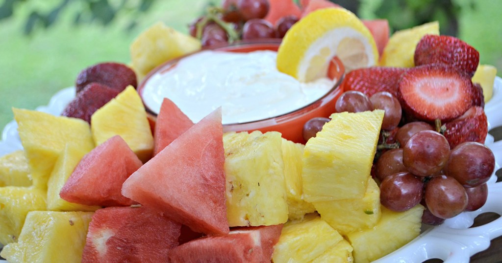 platter of fruit around fruit dip