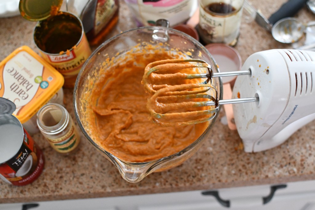 mixing up a vegan pumpkin pie